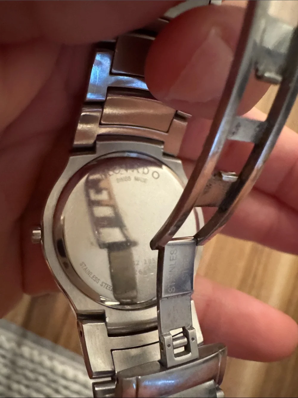 Movado Silver Bracelet Watch with Black Dial